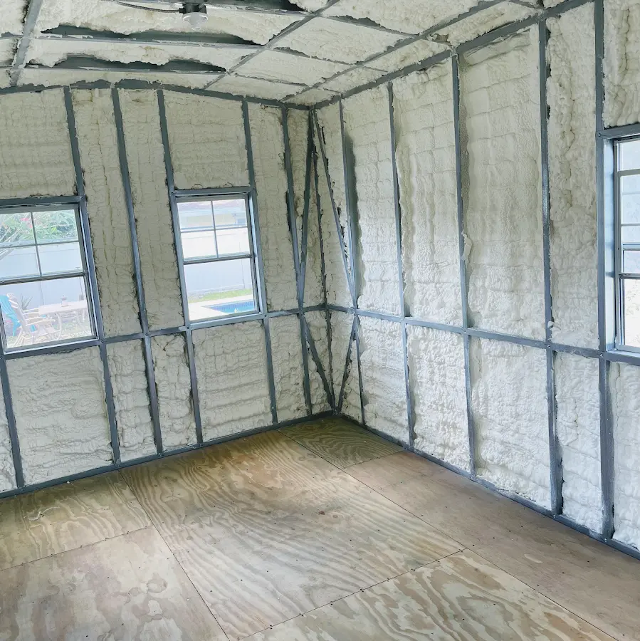 Closed-cell spray foam insulation applied to wall cavities in a residential project in Hueytown